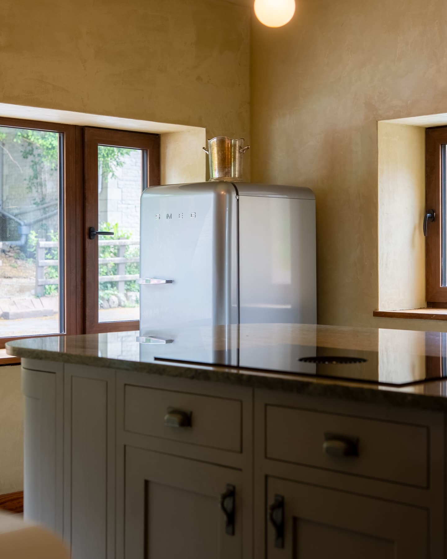 Smeg fridge and induction hob on the island