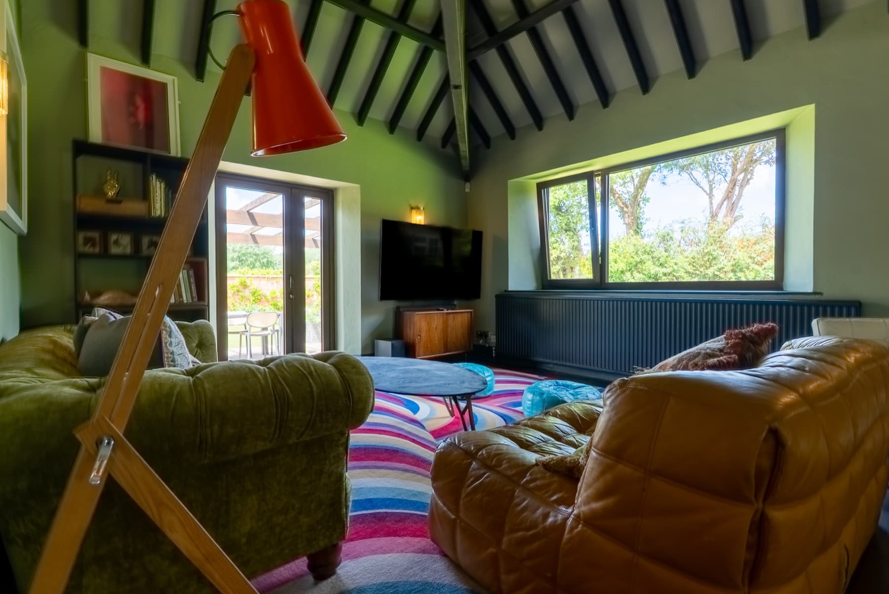 Garden doors and television wall in the sitting room